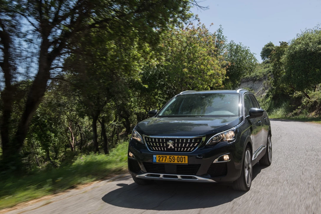 1594304-השוואתי פנאי - יונדאי טוסון מול מאזדה CX-5 מול פיגו 3008 מול קיה ספורטאז (33).jpg