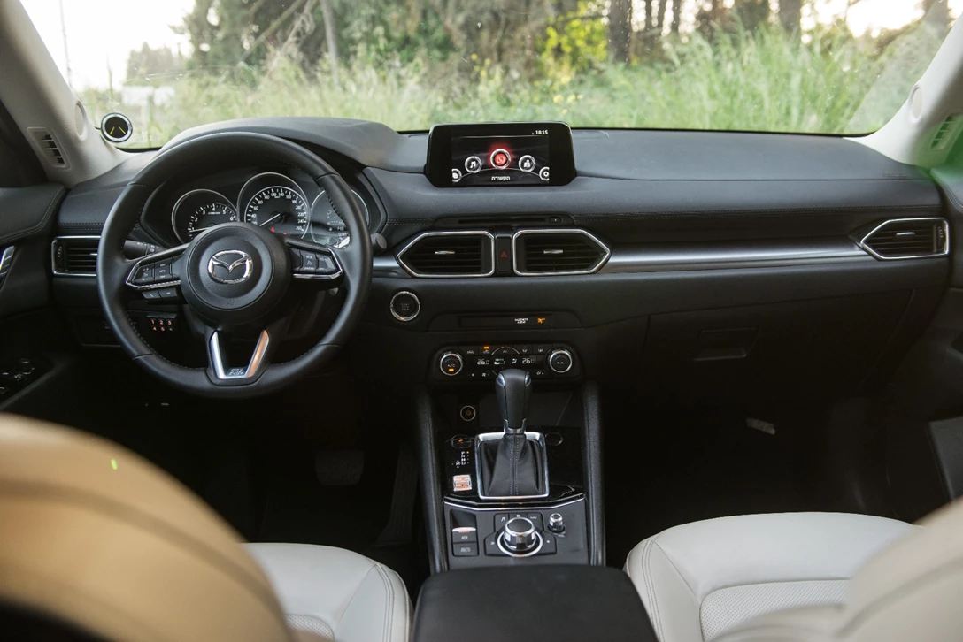 1594296-השוואתי פנאי - יונדאי טוסון מול מאזדה CX-5 מול פיגו 3008 מול קיה ספורטאז (25).jpg