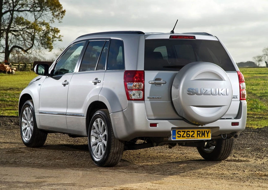 1703551-Suzuki-Grand_Vitara-2013-1280-3e2e4c7883dc7242bd8e59d110c97d2cd7.jpg
