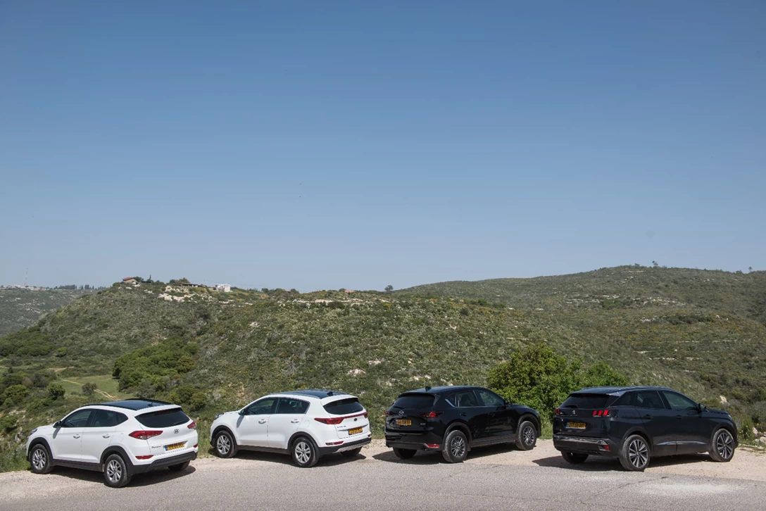1594280-השוואתי פנאי - יונדאי טוסון מול מאזדה CX-5 מול פיגו 3008 מול קיה ספורטאז (3).jpg