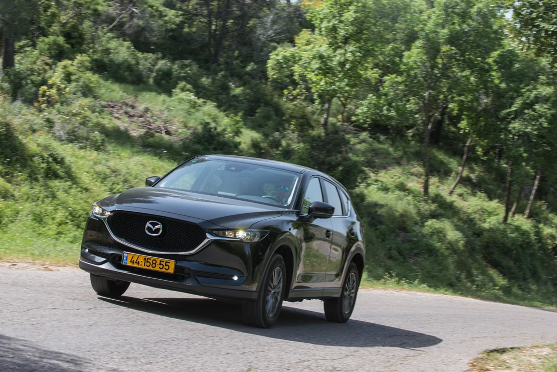 1594315-השוואתי פנאי - יונדאי טוסון מול מאזדה CX-5 מול פיגו 3008 מול קיה ספורטאז (13).jpg