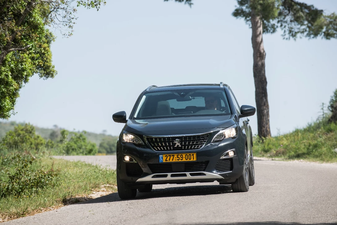 1594283-השוואתי פנאי - יונדאי טוסון מול מאזדה CX-5 מול פיגו 3008 מול קיה ספורטאז (6).jpg