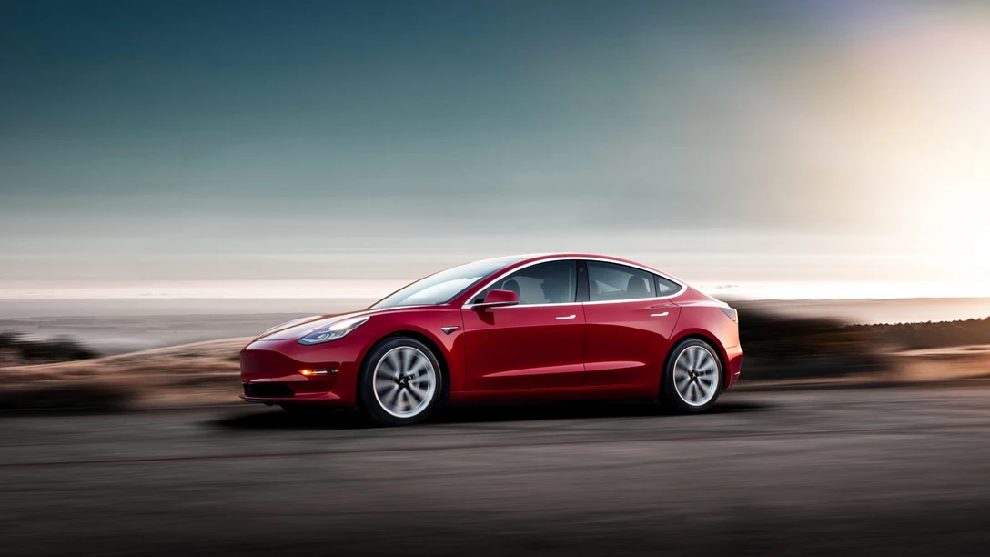 1590167-Model 3 - Red Driving Sunset.jpg