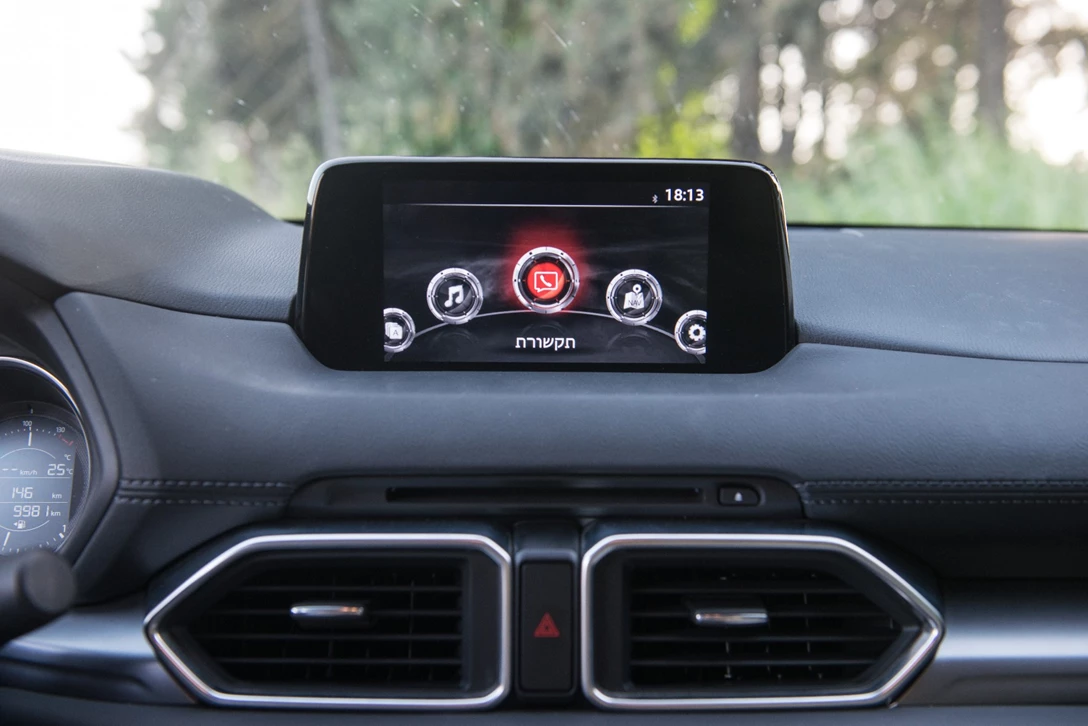 1594294-השוואתי פנאי - יונדאי טוסון מול מאזדה CX-5 מול פיגו 3008 מול קיה ספורטאז (23).jpg