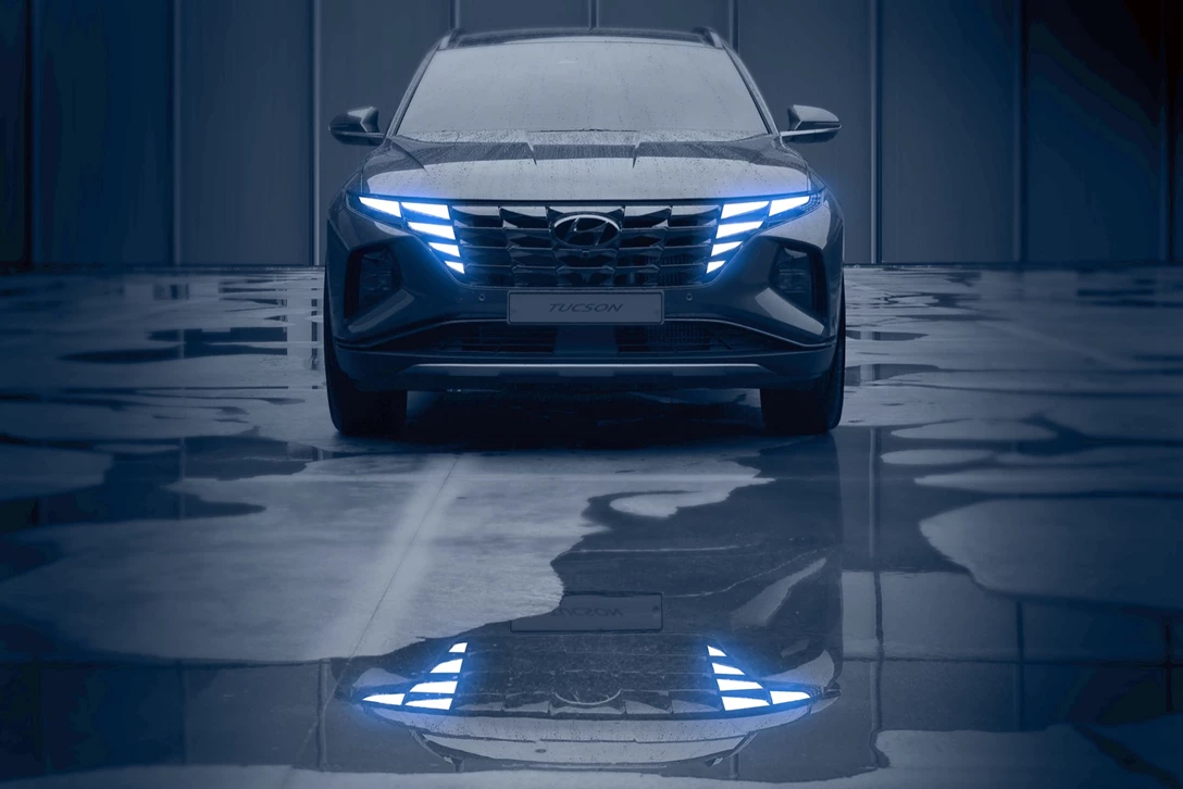1634914-Large-42871-All-NewHyundaiTucsonAddsRevolutionaryRedesign.jpg