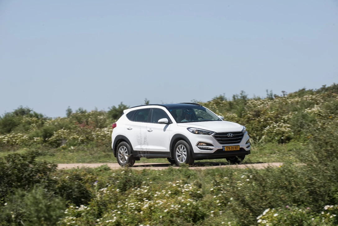 1594311-השוואתי פנאי - יונדאי טוסון מול מאזדה CX-5 מול פיגו 3008 מול קיה ספורטאז (40).jpg