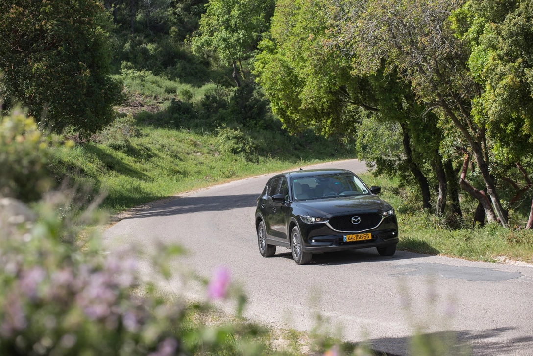 1594282-השוואתי פנאי - יונדאי טוסון מול מאזדה CX-5 מול פיגו 3008 מול קיה ספורטאז (5).jpg