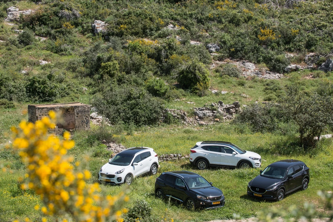 1594278-השוואתי פנאי - יונדאי טוסון מול מאזדה CX-5 מול פיגו 3008 מול קיה ספורטאז (2).jpg