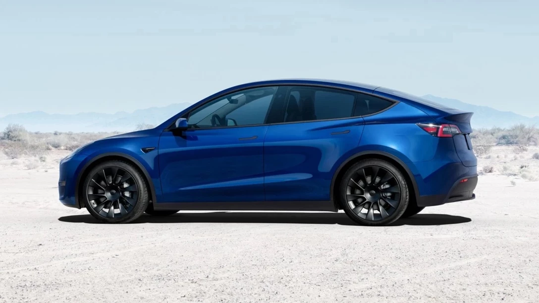 1666296-Side-view-of-blue-2023-Tesla-Model-Y-highlighting-its-release-date-and-price.jpg