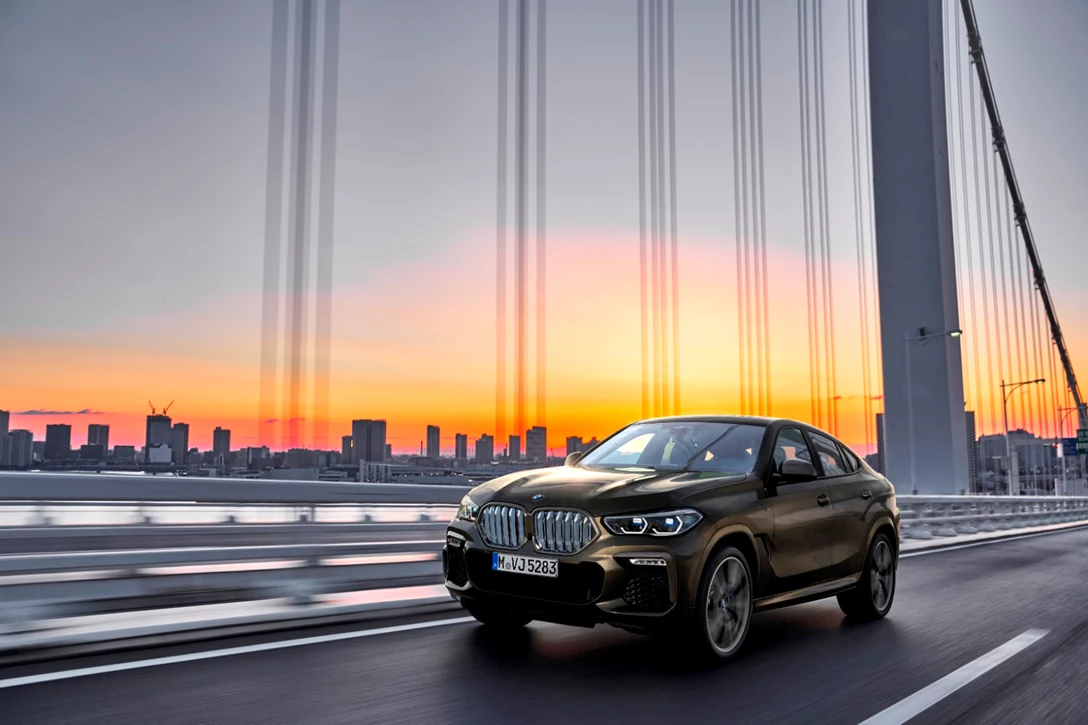 1619046-P90356689_highRes_the-new-bmw-x6-drivi.jpg